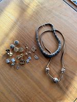 All items laid out showing necklaces and earrings