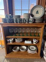 Front view of oak bookcase with shelves