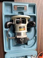 Black & Decker 7620 router seated in blue carry case