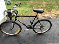 Black Supercycle Sierra Series 15 mountain bike with rear rack