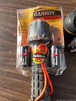Packaged Garrity Trail Lite flashlight with included D batteries