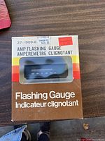 Boxed amp flashing gauge