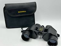 Bushnell binoculars with branded case displayed front view