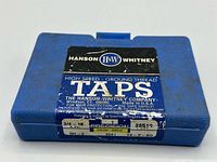 Closed blue Hanson Whitney tap case front label