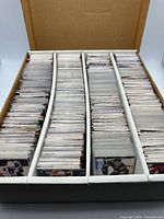 Top view of full 4-row card box showing thousands of hockey cards