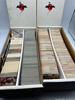 Open view of two 2-row boxes filled with hockey cards