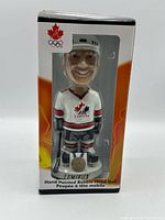 Front of boxed Mario Lemieux bobblehead showing figure through window