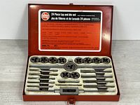 Closed view of open case showing complete set layout