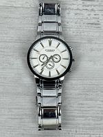 Full view of the Curren stainless steel watch front