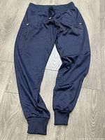 Full view of navy jogging pants front side