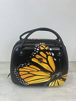 Front view showing butterfly graphic and overall shape