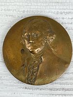 Obverse of bronze medal showing George Washington relief