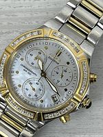 Front view of Citizen watch showing dial, bezel and bracelet