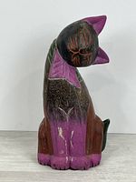 Front view showing full statue, paint colours and wear