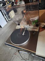 Full view of Mitsubishi turntable with dust cover open