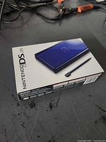 Retail box showing Nintendo DS Lite image and branding