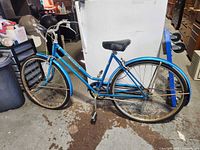 Full view of blue Schwinn Breeze step-through bicycle