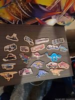 All magnets spread on dark surface showing variety