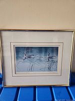 Front view of framed print showing artwork, mat, frame