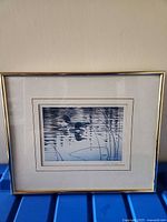 Front view of framed print showing artwork, matting and frame