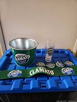 Full set showing bucket, bar mat, stacked cups and four coasters