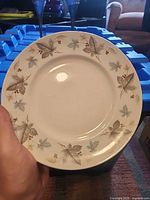 Front view showing leaf and berry motif