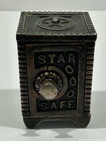 Front view showing STAR SAFE dial, coin slot and star emblem on top