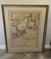 Framed sepia atlas map showing Atlantic Canada regions, full frame view