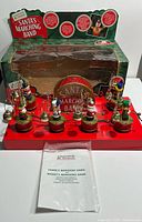 Complete set displayed with original box and manual visible