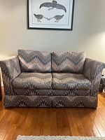 Front view of patterned loveseat