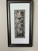 Tall framed floral print with metallic brown frame and white mat