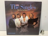 Front cover of ABBA The Singles: The First Ten Years gatefold album