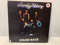 Front cover showing artist, album title, condition wear