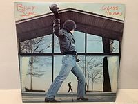 Front view of Billy Joel "Glass Houses" album cover standing upright