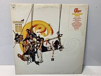 Front jacket displaying cover art and track list sticker