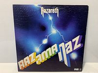 Front jacket design with lightning graphic and album title