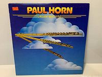 Front jacket art showing title and artist