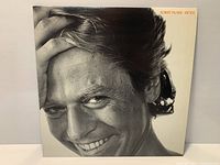 Front cover of Robert Palmer Riptide LP showing overall condition