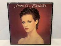 Album front cover with portrait of Sheena Easton; visible edge and corner wear