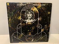 Front of LP jacket showing artwork and title