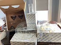 group shot showing platter, vase, bowl, champagne coupes and Princess House boxes