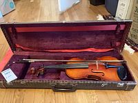 Violin, bow and case overall view