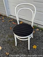 Front view of white bentwood chair showing frame and seat