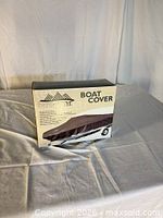 Front of boxed Tera Gear boat cover showing product image