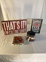 Overall lot view with both signs, jar and tealights