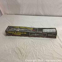 Full view of boxed 1-ton cable puller