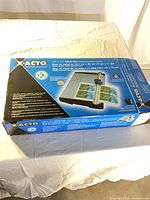 Front of boxed X-ACTO rotary trimmer