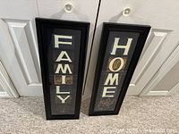 Front view of both framed pictures FAMILY and HOME