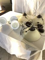 Overview of all six light fixtures on table