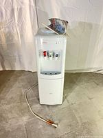 Full view of Sunbeam water cooler with cord
